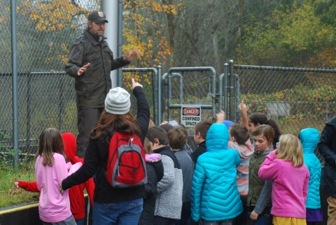 Staff member providing a facility tour at Quilcene National Fish Hatchery